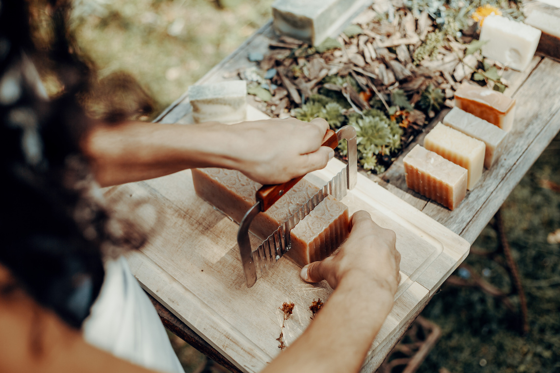 Woman is making handmade natural soaps